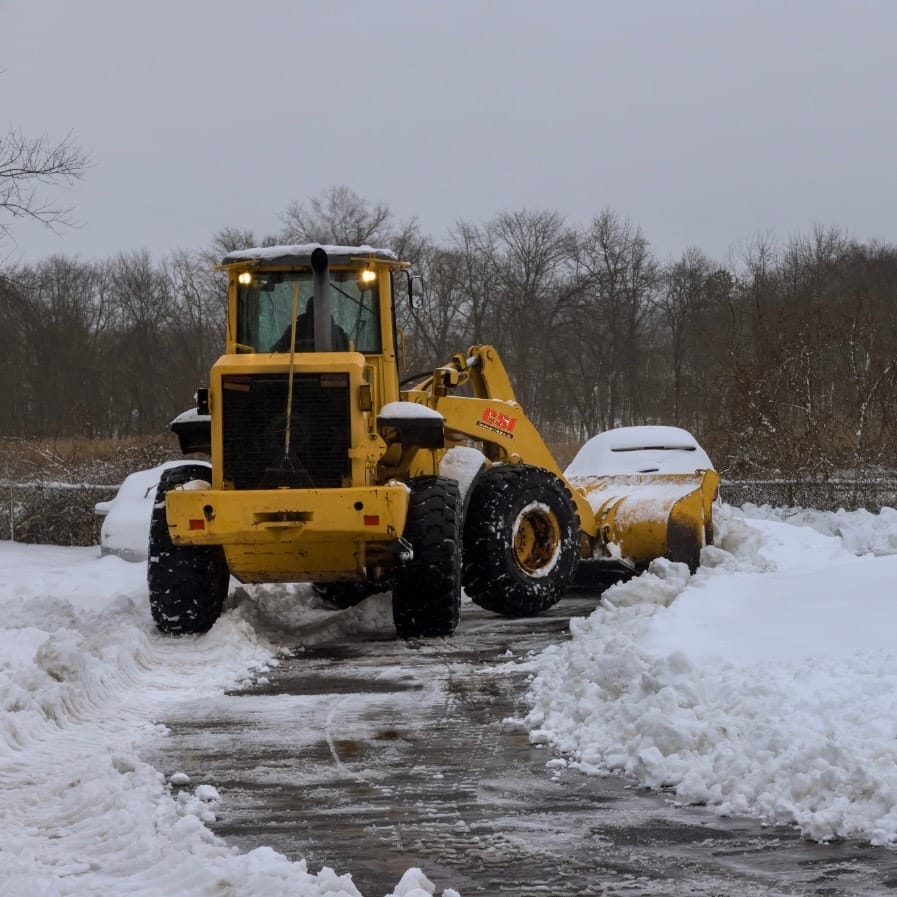 snow removal with front end loader on commercial property
