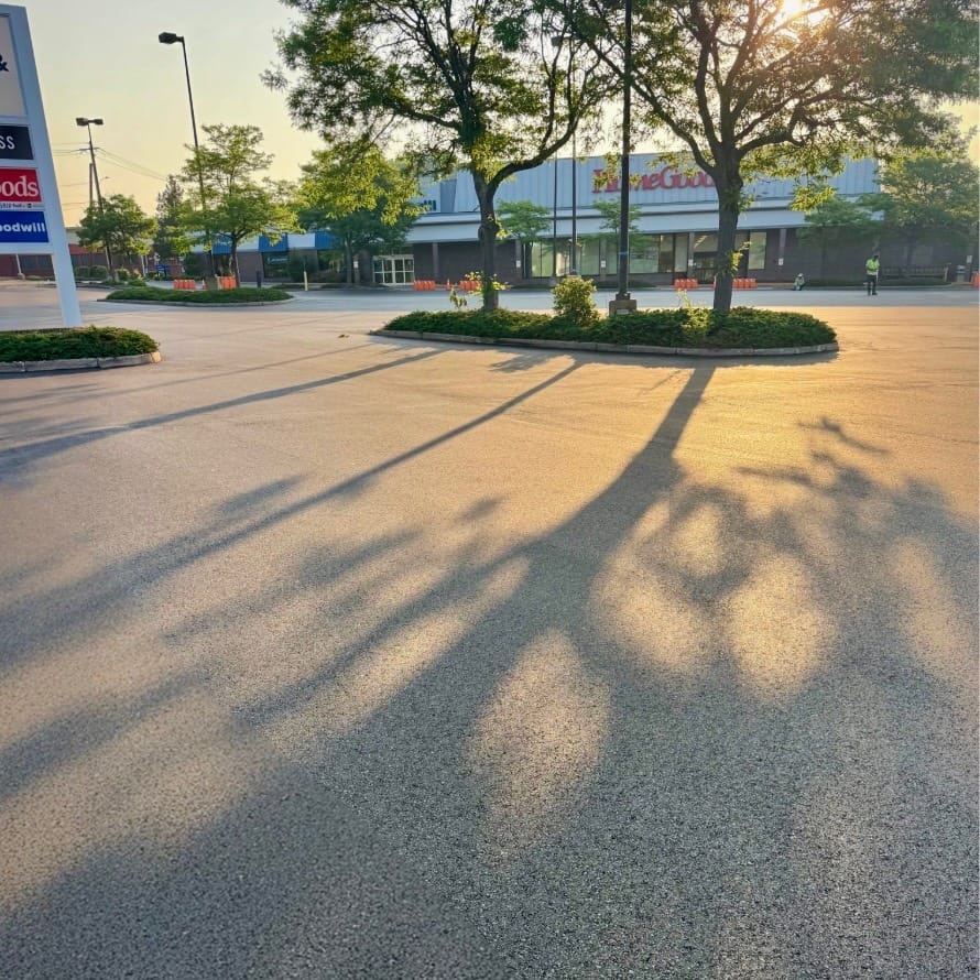 paving commercial lot- property management; construction solutions inc