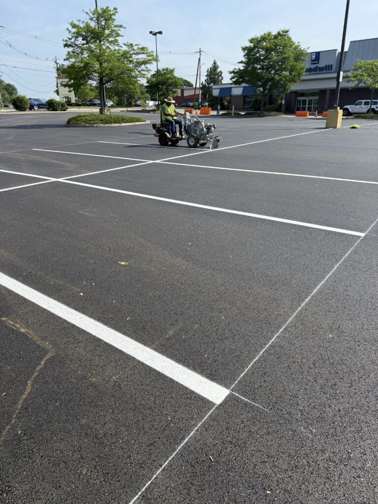 Capital improvement project; parking lot line striping after repaving commercial plaza