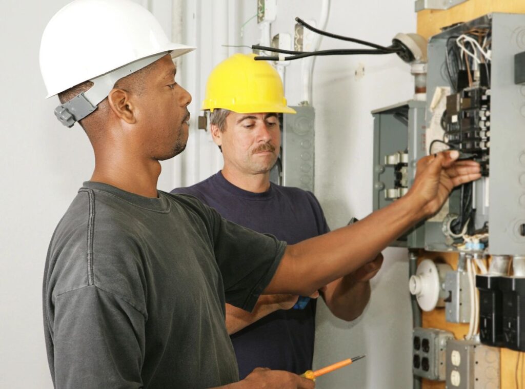 electrical contractor going over new panel install