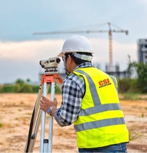 measuring grade to stake out lot for commercial construction in Massachusetts