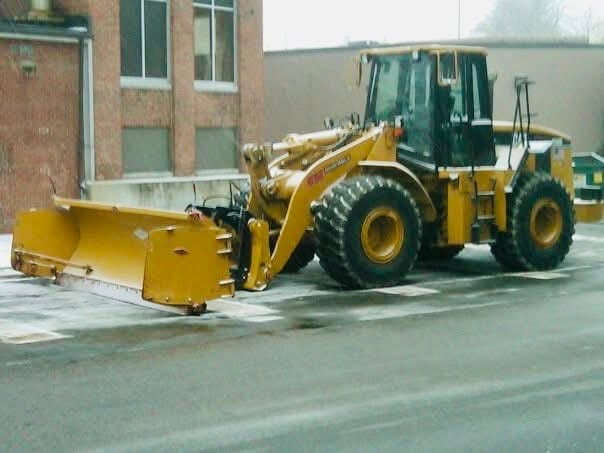front end loader cleaning snow
