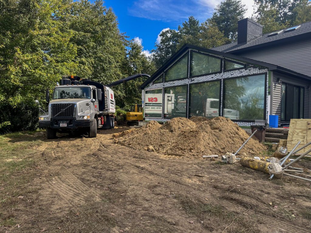 foundation being excavated for new footings are pilings